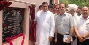 Minister for PHE, Sham Lal Sharma inaugurating WSS at Chowki on Thursday.