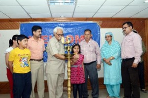 V K Sambyal, Director Radio Kashmir Jammu lighting the traditional lamp to inaugurate Summer Children Workshops in Jammu.