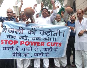 Residents of Jammu West Assembly constituency holding protest demonstration at Jammu on Monday.