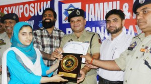 Winners of symposium being felicitated by SP Mubassir Latifi in Rajouri.