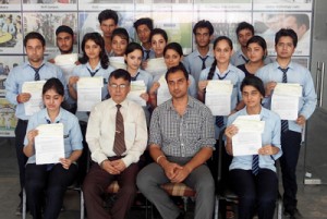 Rahul Pathania, Director VGC along with meritorious student of the college posing for group photograph on Tuesday.