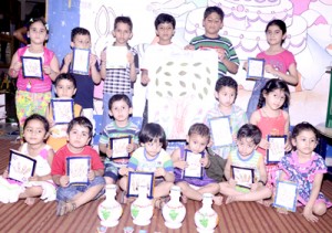 Students of Dream Care Play Way School posing for a group photograph.  