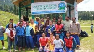 Winners of Mountain Running Challenge posing for a group photograph.