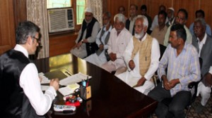 Chief Minister Omar Abdullah interacting with a delegation at Srinagar on Friday.