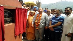 Ex-Minister and MLA Rajouri, Shabir Ahmed Khan laying foundation stone of Community Hall at Sadyal in Rajouri.