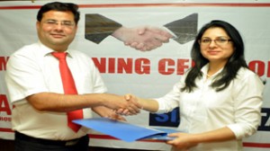 Sangeet Growar, Head India Operations, Six Capital and Dr Anshu Kataria, Chairman, Aryans Group of Colleges during MoU signing ceremony.