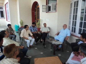 Minister for R&B Abdul Majid Wani interacting with delegation at Jammu on Thursday.