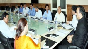 Minister of State for Industries, Sajjad Ahmad Kichloo addressing Board of Directors meeting of JKI at Srinagar on Saturday.
