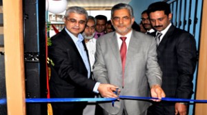Chairman JKB Mushtaq Ahmad inaugurating PNB MetLife branch at Srinagar on Tuesday.