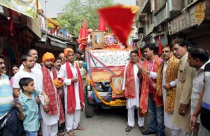 General secretary, JKPCC flagging off Shri Saroli Kalka Mata yatra from Jammu on Wednesday.