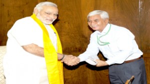 MP Thupstan Chhewang with Prime Minister, Narendra Modi at New Delhi on Wednesday.