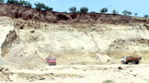 A view of excavation of Karewas land by mafia at Pampore.