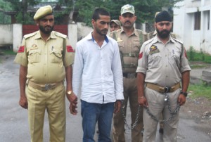 A militant in police custody at Poonch on Tuesday.—Excelsior/Harbhajan