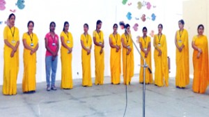 Teaching and non teaching staff of JP World School posing during Orientation Programme.