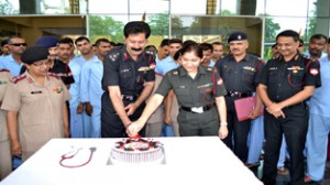 GOC, White Knight Corps cutting cake to declare open the 44th Raising Day Celebrations of 166 Hospital at Jammu on Tuesday.