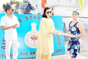 Swimmer being felicitated at Air Force Station in Jammu.