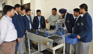 Students of Global Institutes displaying the developed innovative Robot. 