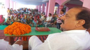 MLA Surjeet Singh Slathia addressing public gathering on Tuesday.