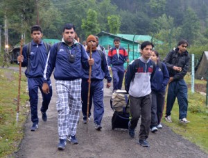Yatris on way to holy cave via Pahalgam track on Saturday.  -Excelsior/Amin War