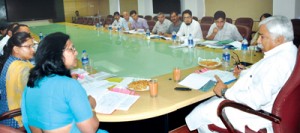 Minister for Labour, Ajay Sadhotra chairing a meeting at Jammu on Monday.