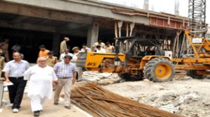 Minister for PWD, Abdul Majid Wani inspecting work on new Legislature Complex in Jammu on Tuesday.