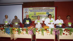 Minister for Agriculture GH Mir, Minister for Housing and Sports Raman Bhalla and others at symposium at SKUAST-J on Wednesday.