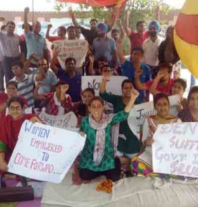 Dental surgeons raising slogans during chain hunger strike at Jammu on Monday.