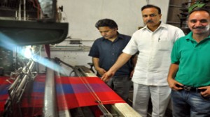 Minister of State for Industries, Sajad Ahmad Kichloo inspecting an industrial unit at Srinagar on Tuesday.