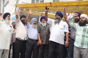 Sikh leaders protesting against UP Government at Jammu on Monday.