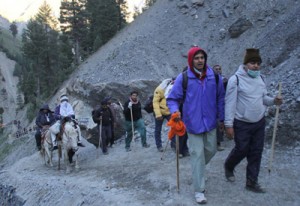 Pilgrims on way to holy cave via Baltal on Friday. -Excelsior/Amin War