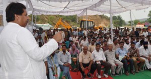 Minister for Housing, Raman Bhalla addressing public meeting at Chatta on Sunday.