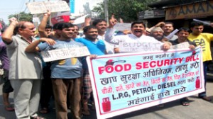 Residents of Jammu West Assembly raising slogans at New Plots on Friday.