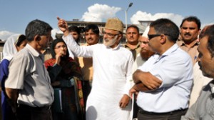 Minister for Panchayats, Ali Mohd Sagar interacting with people during his visit to various parts of Srinagar on Friday.