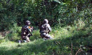 Army personnel take positions during encounter in Keran sector on Friday. -Excelsior/Abid Nabi