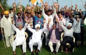 Congress activists shouting slogans during a protest demonstration at Gurha Morh on Thursday.