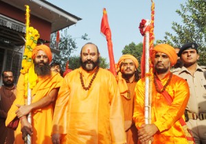 Holy mace led by Mahant Deependra Giri leaving Dashnami Akhara Srinagar for holy cave on Wednesday.—Excelsior / Amin War