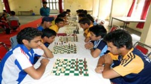 Players exhibiting skills in Chess event organised during 45th KVS Regional Sports Meet at KV No 1, Gandhi Nagar on Tuesday.