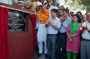 Former Minister & MLA Vijaypur, Surjeet Singh Slathia inaugurating the renovated pond on Sunday.