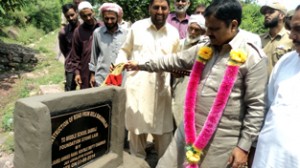 Dy Chairman Legislative Council Javed Rana laying foundation stone of road in Mendhar.
