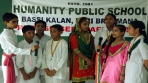 Students presenting group song during Inter-house singing competition at Humanity Public School in Samba. 