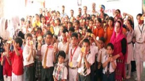 Participants of 2nd Highland Kids Sports Meet posing for a group photograph during concluding function on Wednesday.