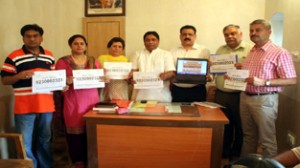 BJP leaders launching Mobile SMS Number at Jammu on Thursday.