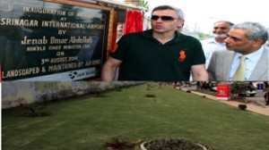 Chief Minister Omar Abdullah inaugurating pathway at Srinagar Airport on Sunday.