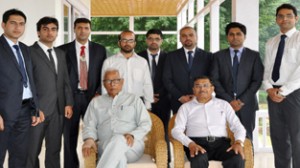 Governor, N N Vohra along with the Civil Services qualifiers from J&K at Raj Bhavan on Friday.