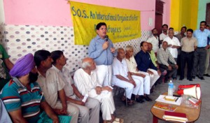 SOS chairman, Rajiv Chuni addressing DPs of PoJK at Nowshera on Friday.