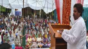 Minister for Housing, Raman Bhalla addressing a gathering in Gandhi Nagar constituency on Monday.