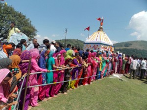 Devotees in a queue at Sankri Mela.