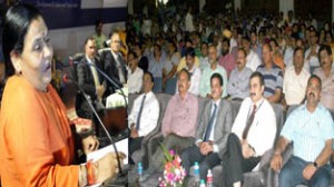 Union Minister Uma Bharti addressing a function during the launch of PMJDY at Jammu on Thursday.-Excelsior/ Rakesh