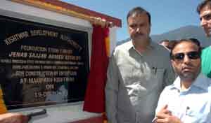 Minister of State for Industries and Commerce, Sajjad Ahmed Kichloo laying foundation stone of welcome gates at Kishtwar on Tuesday.