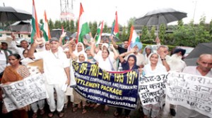 PoJK refugees staging protest in Jammu on Friday. -Excelsior/Rakesh